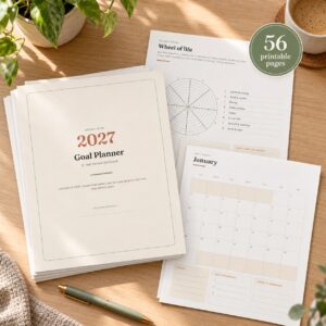 2027 Goal Planner & Year Review Workbook printable pages on a desk